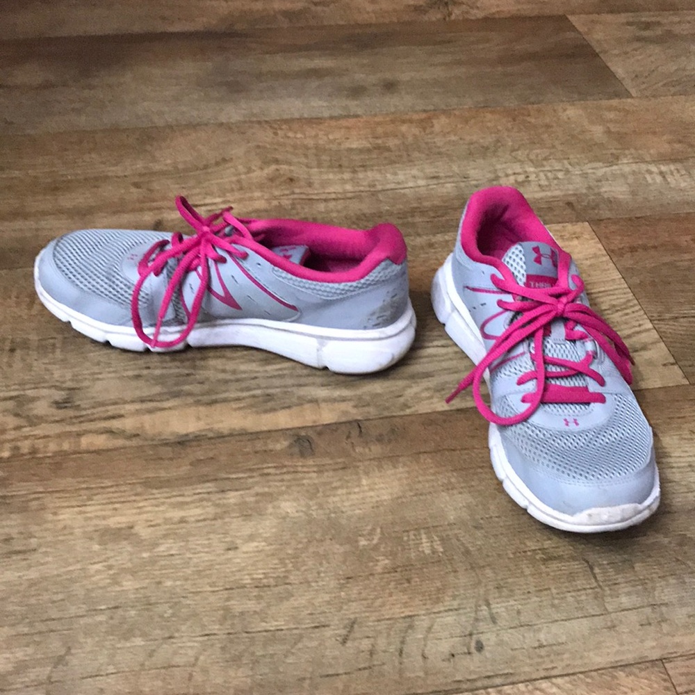 Women’s size 8.5 Under Armour tennis shoes.